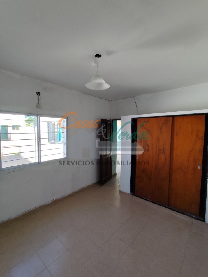 alquiler CASA dos dormitorios, cochera abierta,