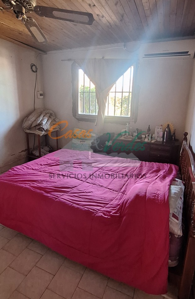 VENTA, casa dos dormitorios, living cocina, MUY AMPLIO PATIO espacio verde